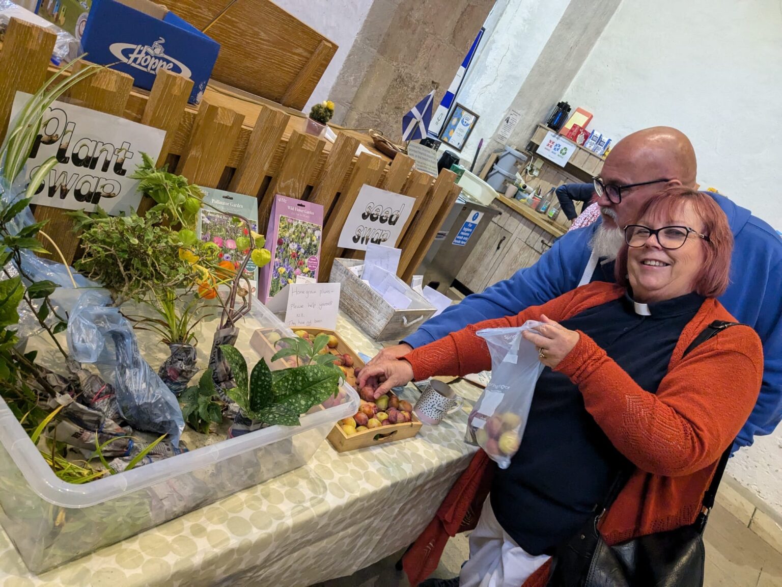picking some home-grown apples at the Environmental Fun Day event at St Andrew’s Church