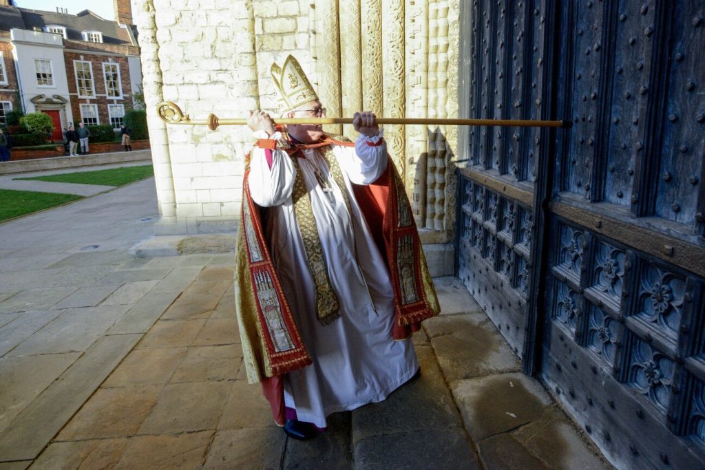 The Bishop knocking on the Cathedral door